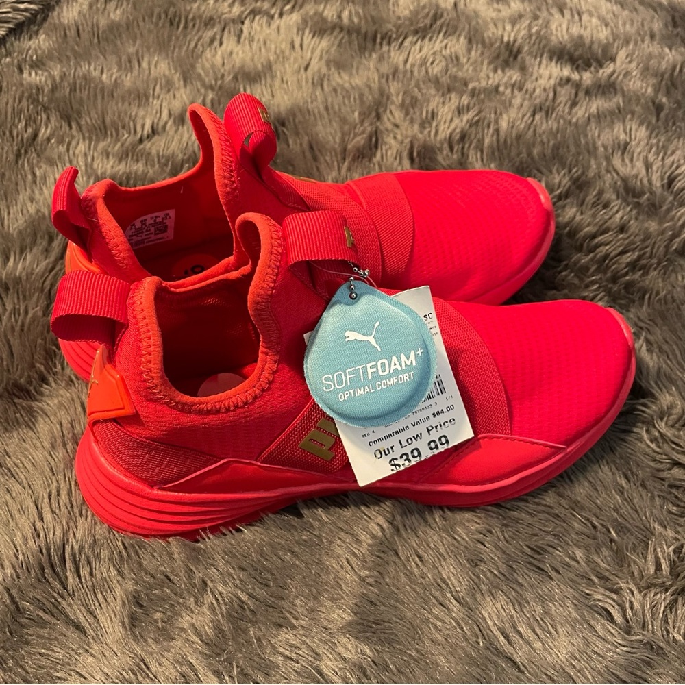 Red puma tennis shoes